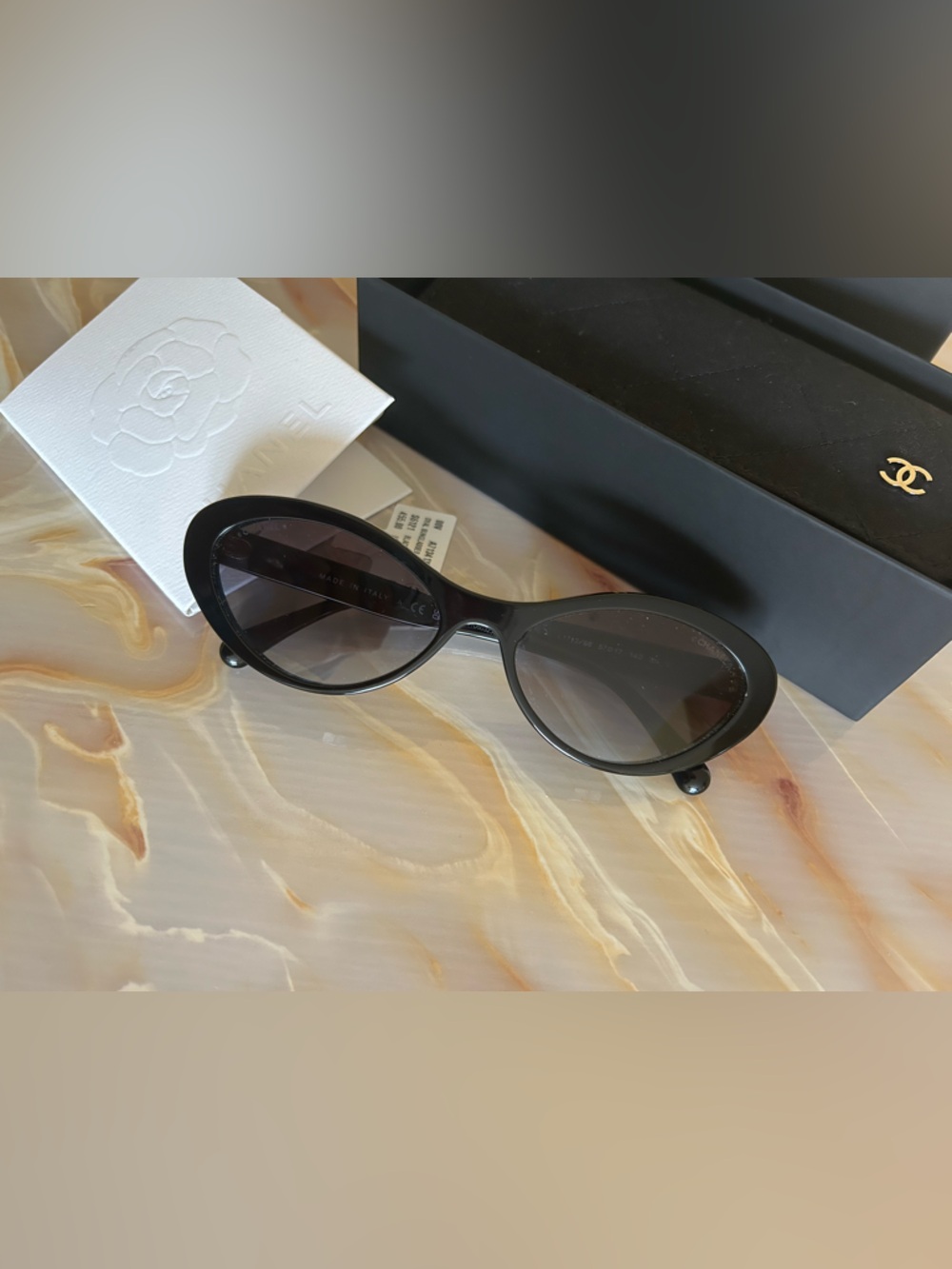 CHANEL Black Gloss Oval Sunglasses with Gold CC Temples - Picture 10 of 12